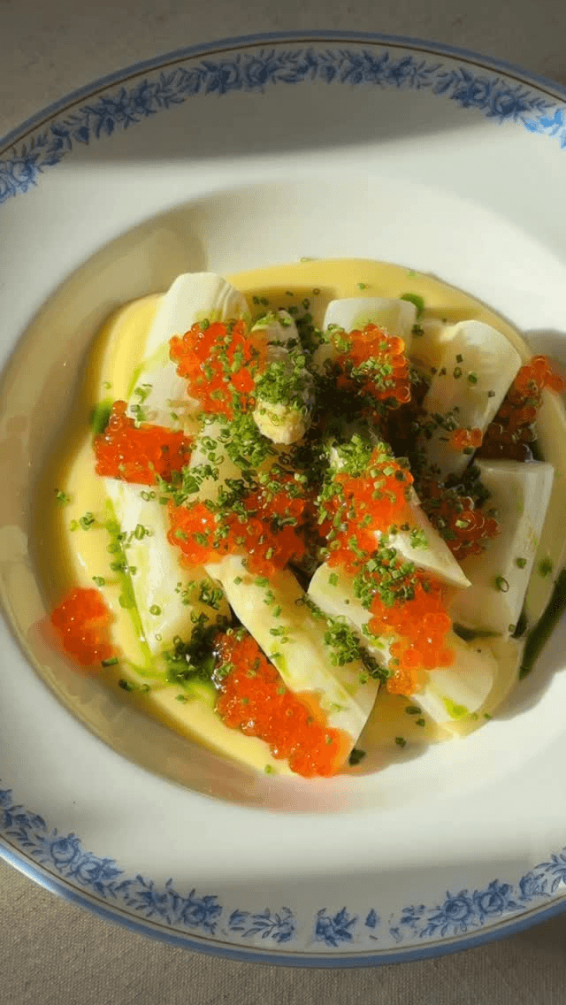 Butter-Cooked White Asparagus with Sandefjord Sauce, Dill Oil, and Trout Roe Thumbnail